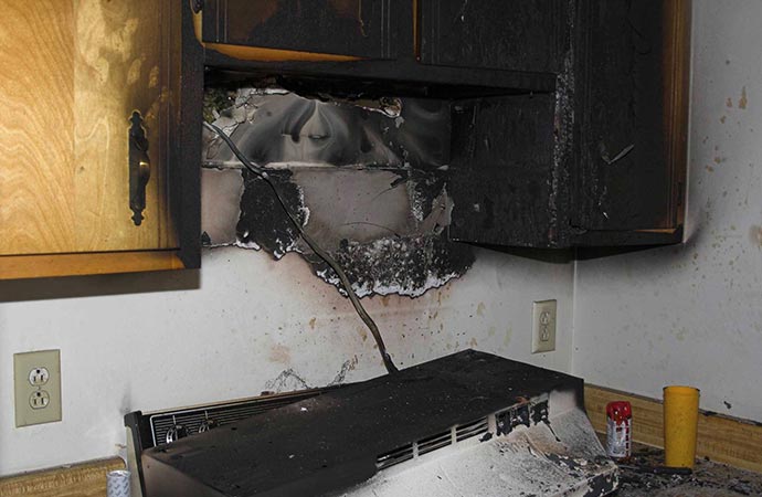 burn wall cabinet inside fire damage house