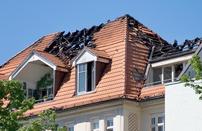 Fire damaged house roof