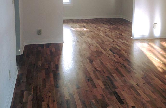 Replacing damaged wood floor for a fresh and updated look.